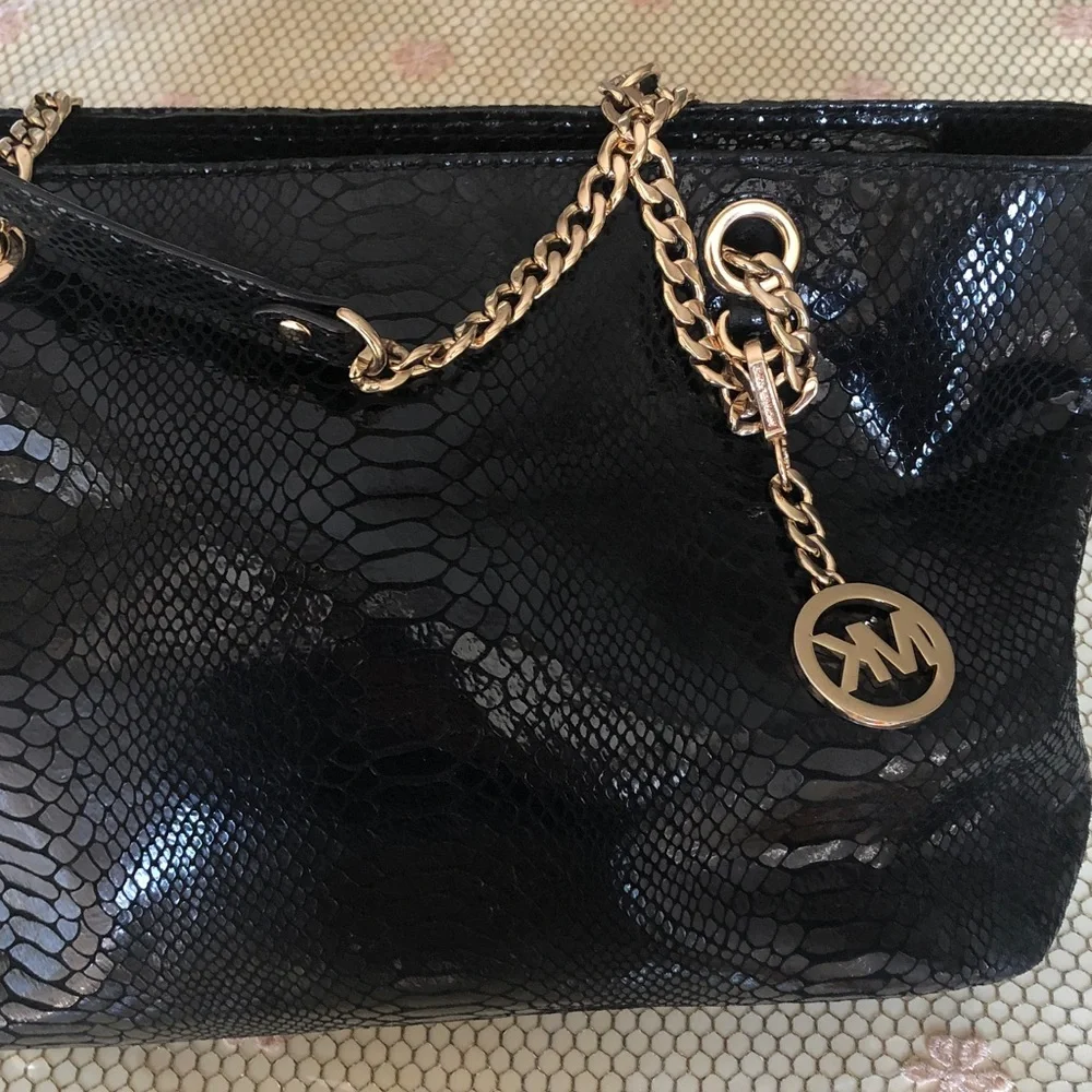 Luxurious Black Embossed Shoulder Bag with Gold Chain